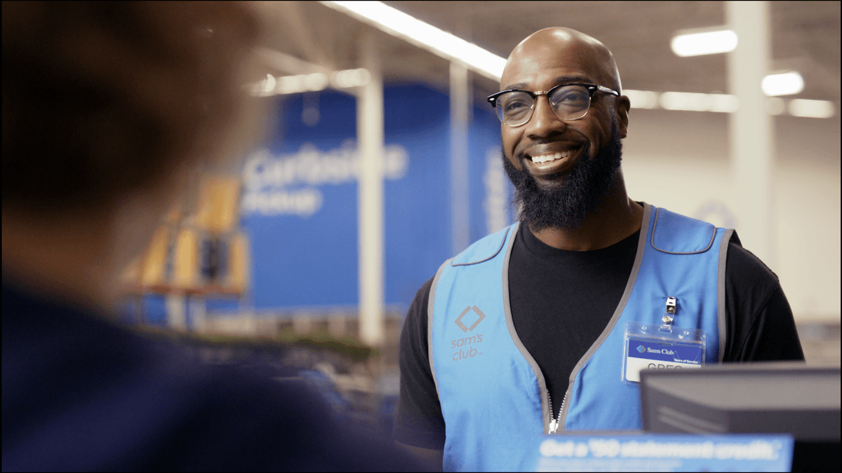 Walmart employee smiling