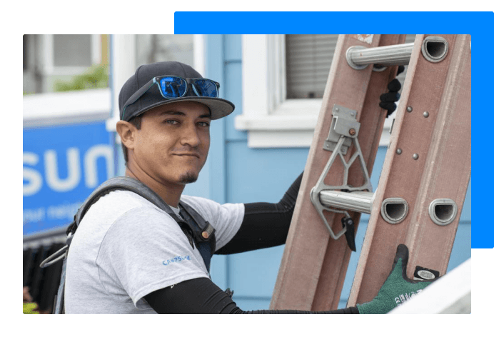 Installer about to climb ladder