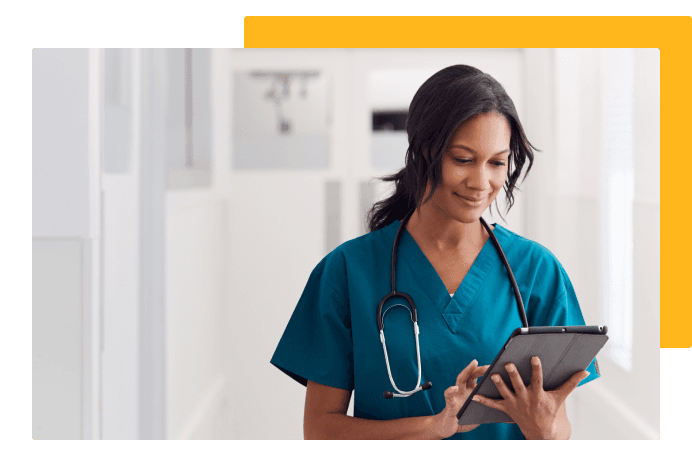 Healthcare worker reading on a tablet