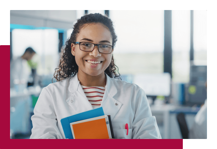 Smiling associate in clinical setting