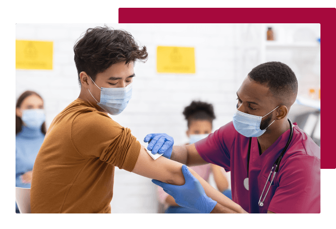 Student treating a patient in a clinical setting