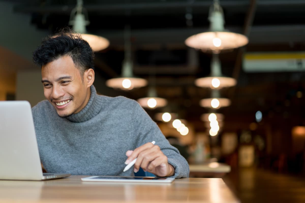 Person writing in notebook