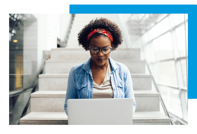 Female employee looking at laptop