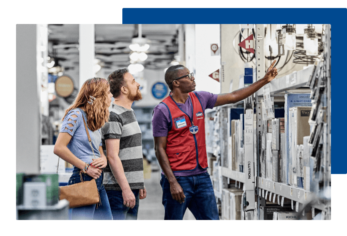 Lowe's associate talking with customers