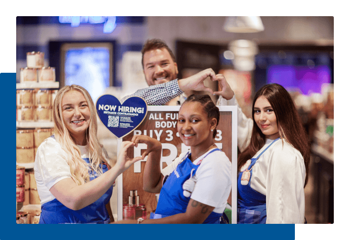 Team of employees smiling at work