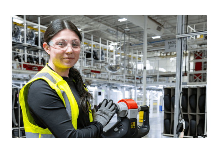 Smiling employee working the line