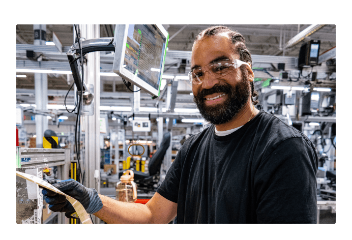 Smiling employee working the line