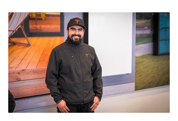 Smiling employee working at the storefront