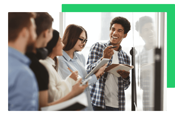 Student laughing with other students