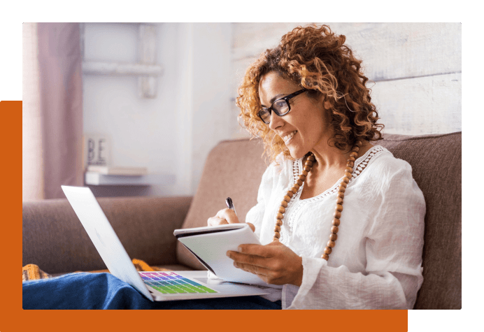 Woman on her computer, studying
