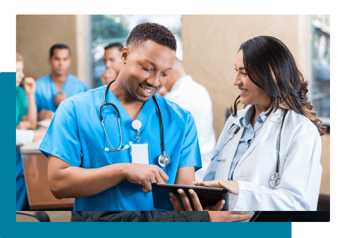 Smiling people working together on a tablet
